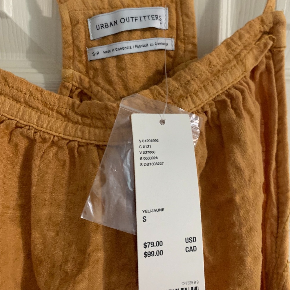 Mustard colored romper Urban Outfitters NWT